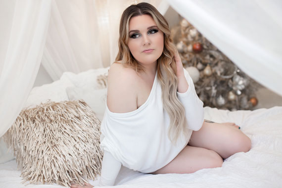 Plus Size Boudoir: Flaunting Her Curves in a Stylish Off-the-Shoulder Sweater